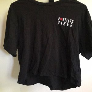 A flowy positive vibe shirt .